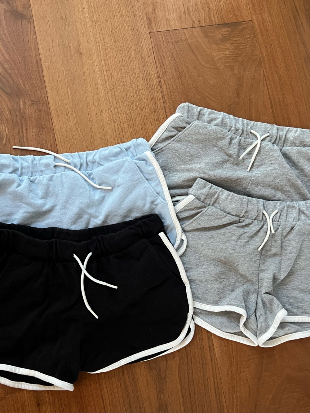 Old Navy Pull-On dolphin-hem Shorts, 4 pair sz.L girls. Gray, black & blue